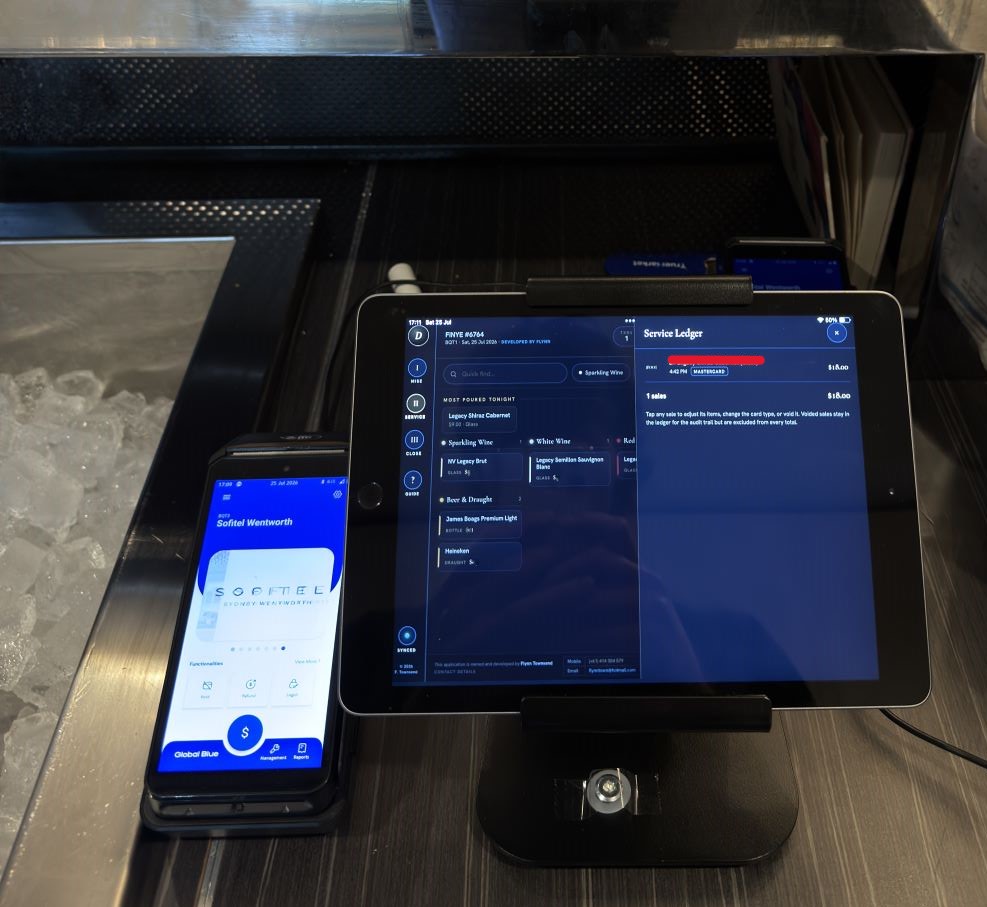 iPad running the tracker, mounted at a banquet bar mid-service